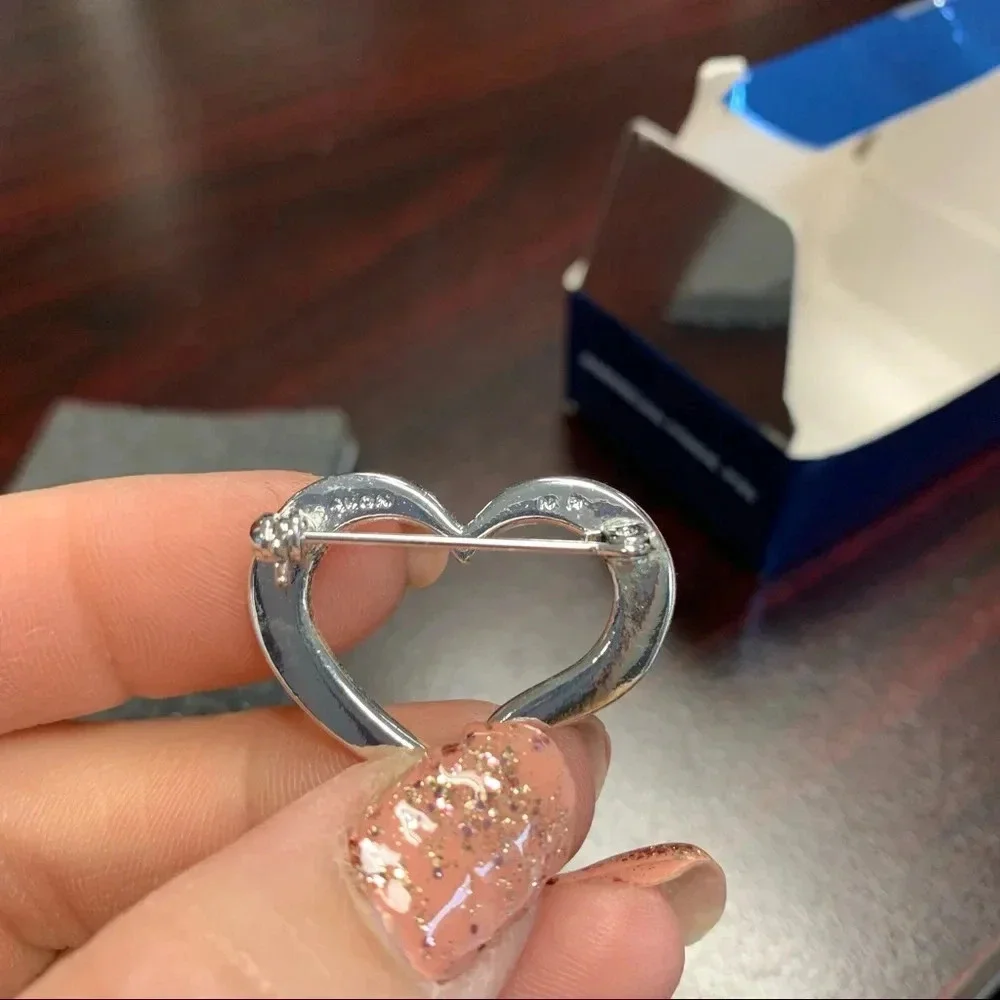 Avon silver heart shaped American flag inspired pin
